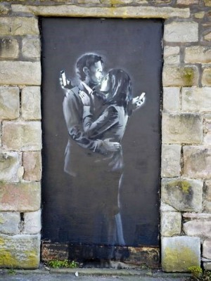 Mobile Lovers by Banksy (PHOTO COURTESY OF THE INDEPENDENT)