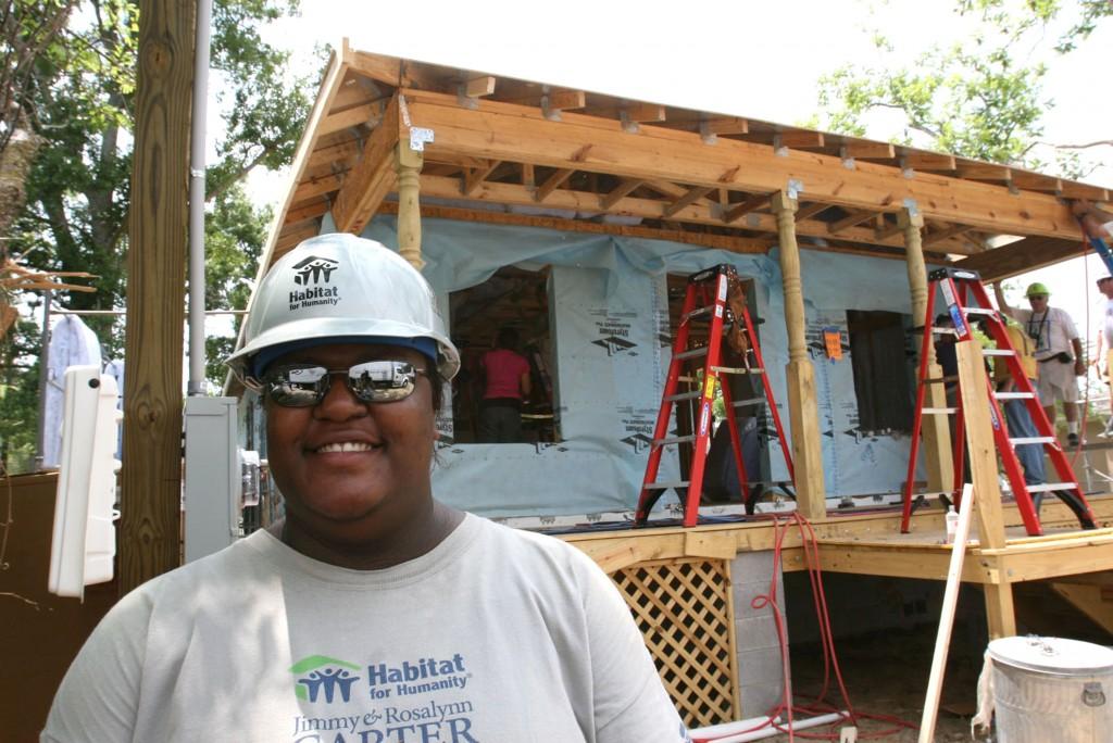 Habitat Angel Lewis stands in front of the new home being built by volunteers during Habitat for Humanity's Jimmy & Rosalynn Carter Work Project in the Forest Heights subdivision in Gulfport, Mississippi, Tuesday, May 13, 2008. (James Edward Bates/Biloxi Sun-Herald/MCT)