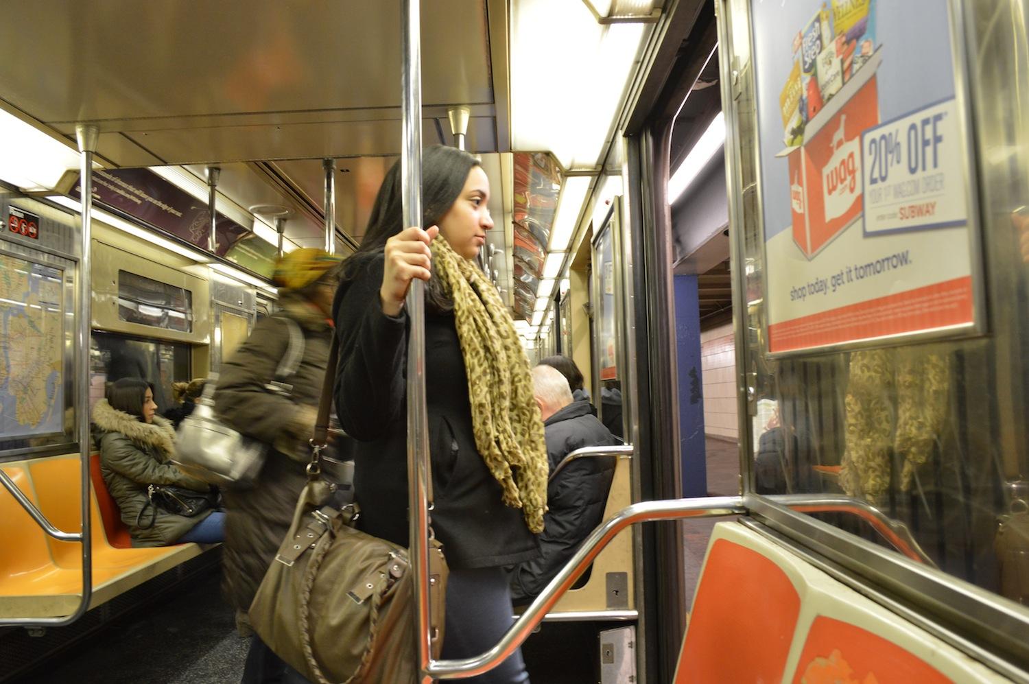 It could be a good two hours before this commuter is able to start working on her ethics paper that’s due the next day. (Ian McKenna/The Observer)