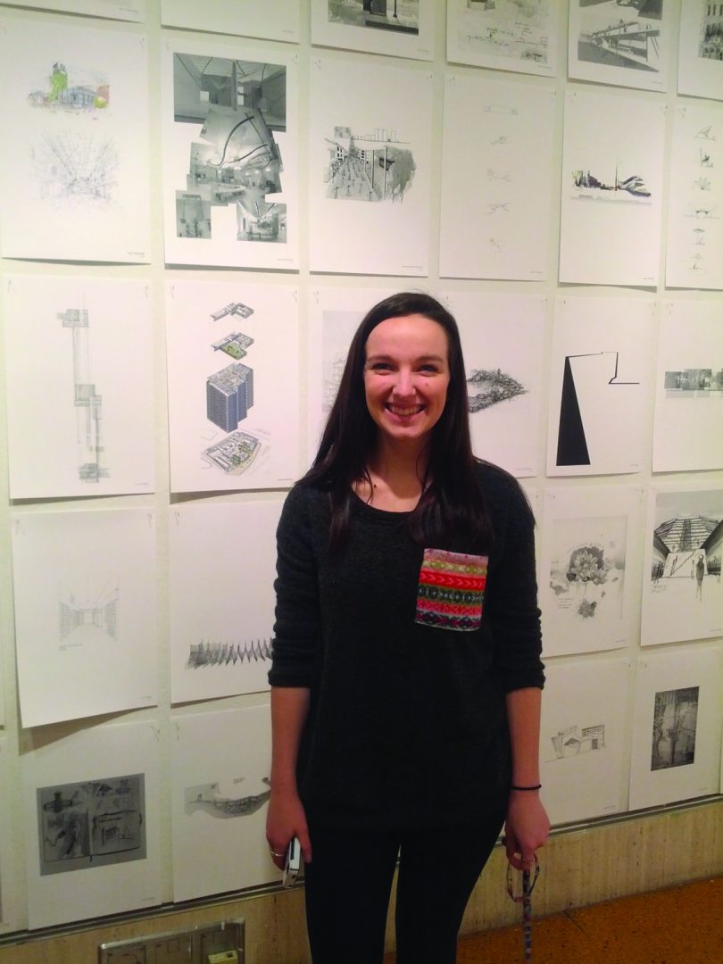 Kathleen Hayes, FCLC ’16, checks out the art gallery at her new school. (Sherry Yuan/The Observer)