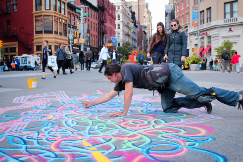 New York City accepts graffiti art onto its scenery; on buildings, walls, subways and sidewalks. Above, an artist works on the streets near Union Square to give a little color to the gray streets of New York. For this photo feature, Observer photographers documented the colorful graffiti world that lives inside the city. (Weiyu Li/The Observer)