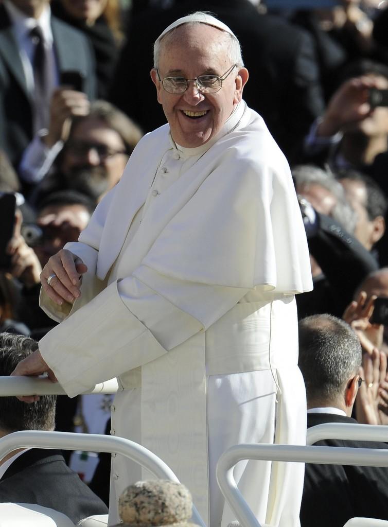 Pope Francis waves to the crowd from the papamobile during his inauguration mass at St Peter's square on March 19, 2013 at the Vatican. World leaders flew in for the inauguration mass for Pope Francis in St Peter's Square on Tuesday where Latin America's first pontiff received the formal symbols of papal power. (Maurizio Brambatti/Ansa/Zuma Press/MCT)