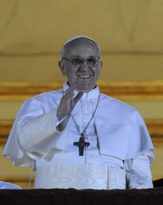 Newly elected Pope Francis I addresses a crowd at the middle balcony of St. Peter's Basilica. (Maurizio Brambatti/Ansa/Zuma Press/MCT)