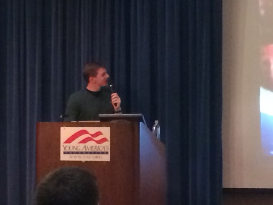 James O'Keefe speaking in Flom Auditorium. (Ian McKenna/The Observer)