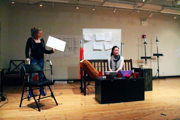 Meaghan McLoed, FCLC '15, and Michele Ang, FCLC '16, rehearse for mainstage show, "Ugly Lies the Bone." The show runs October 9-17. (Kirstin Bunkley/The Observer.)