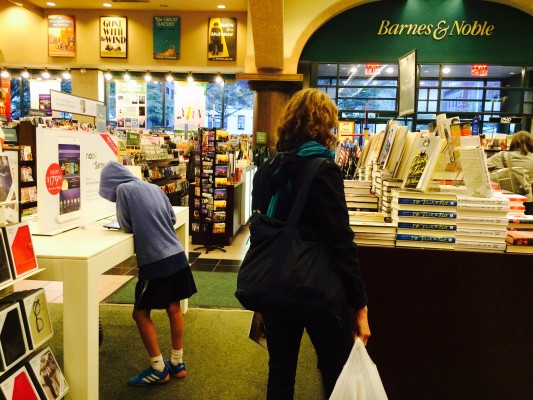 Barnes & Noble shoppers contemplate whether to buy their books in print or to invest in an e-reader. (Lauren Macdonald/The Observer) 