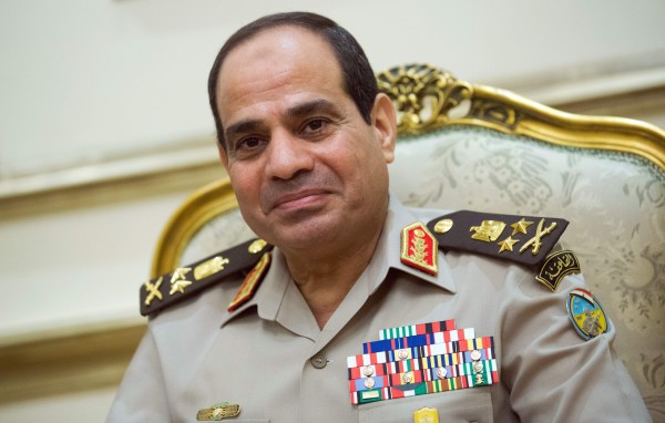 Egyptians are divided over military ruler Abdulfattah Al-Sisi (pictured above), and Mohamed Morsi. (photo courtesy of Michael Kappeler/Zuma Press via TNS)