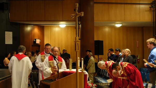 Members of Campus Ministry begin the ceremony. (ANA FOTA/THE OBSERVER)