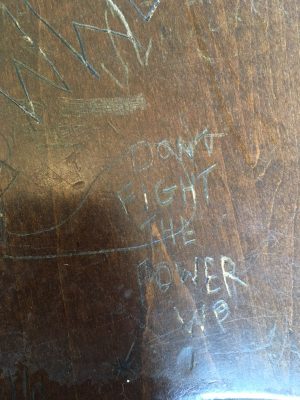 The alleged white power slur was found carved into a Rose Hill desk this morning.
