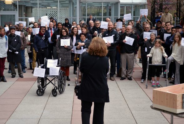 Professor Micki McGee addresses the crowd at the protest on April 19. (ELIZABETH LANDRY/The Observer)