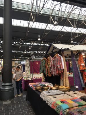 The merchants at Spitalfield Market sell an array of colorful clothing and decor items. (NADINE SANTORO/THE OBSERVER)